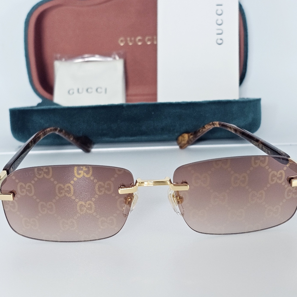 GUCCI UNISEX GG1221S 004 GUCCI RIMLESS GG LOGO ON LENS SUNGLASSES - Picture 4 of 13